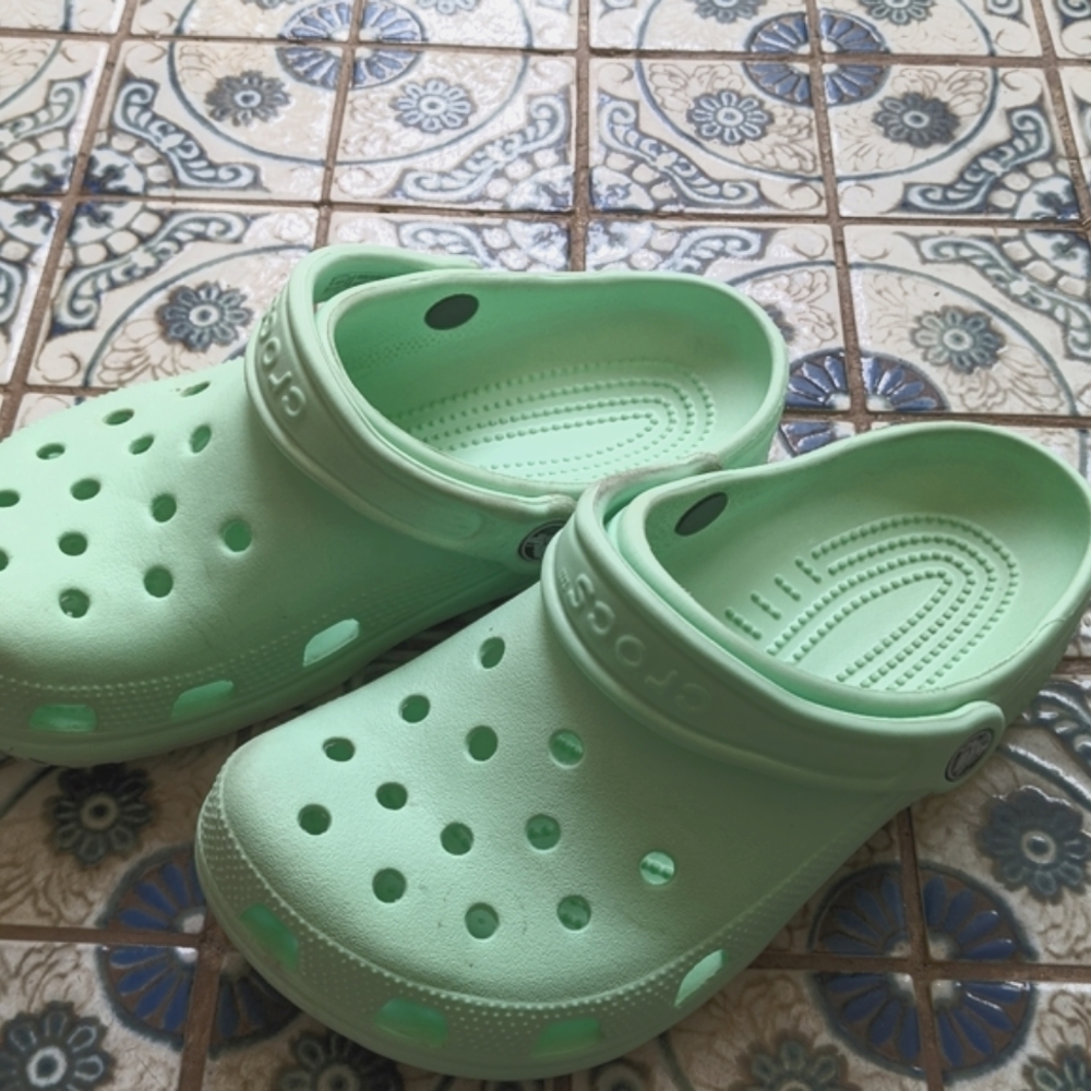 Mint green Crocs WITH 9 jibits!!